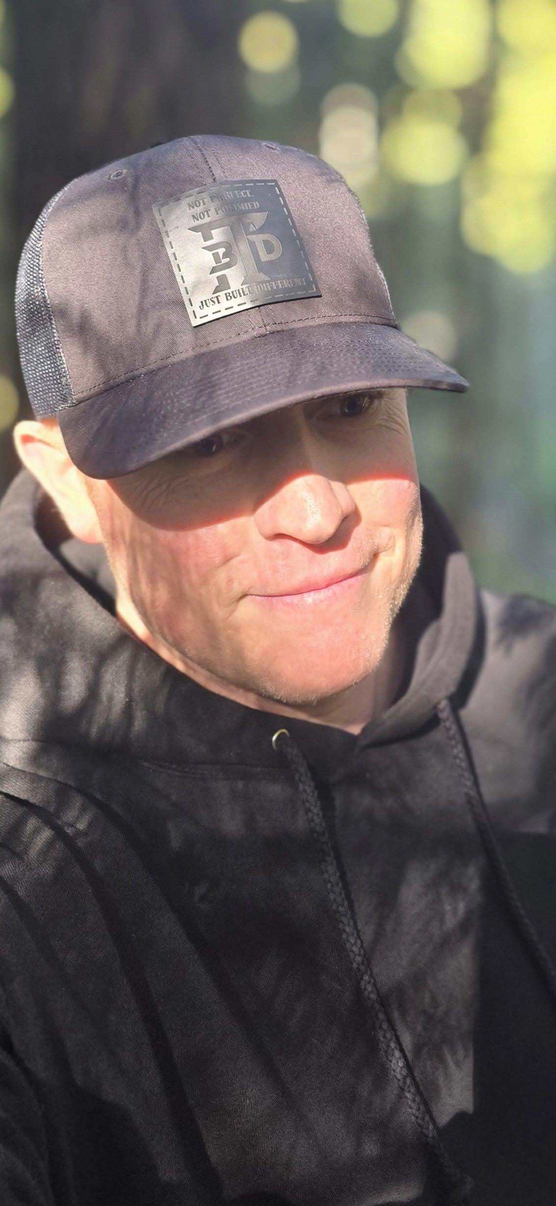 NPNP Black/Black Trucker Hat
